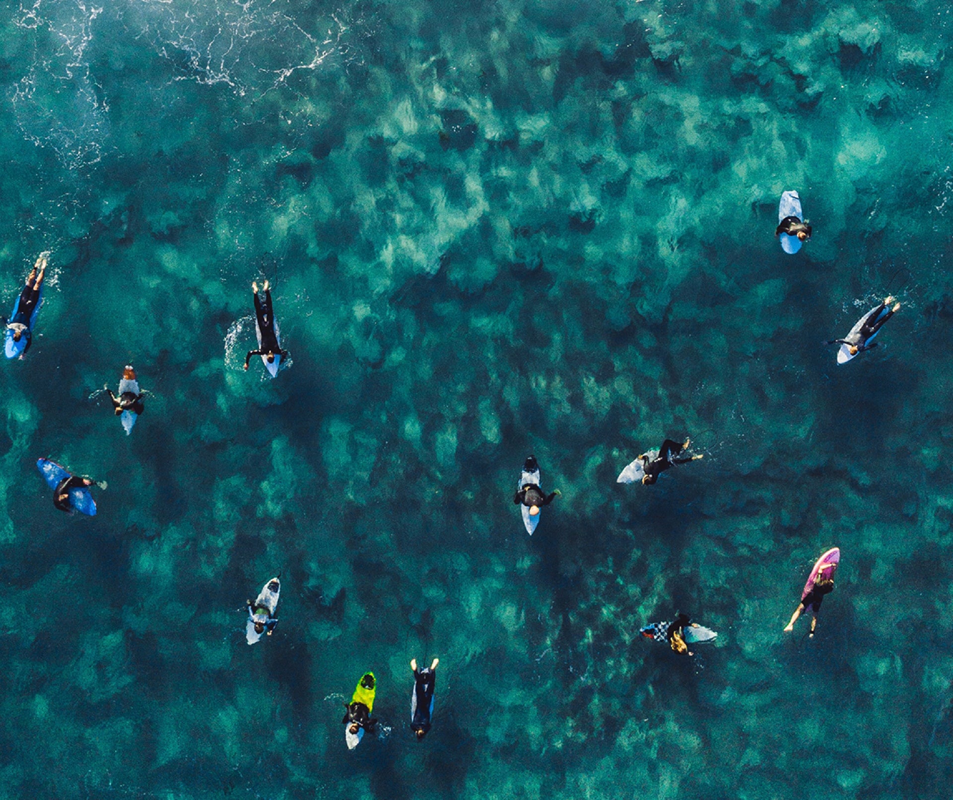 kayakers paddling in the ocean